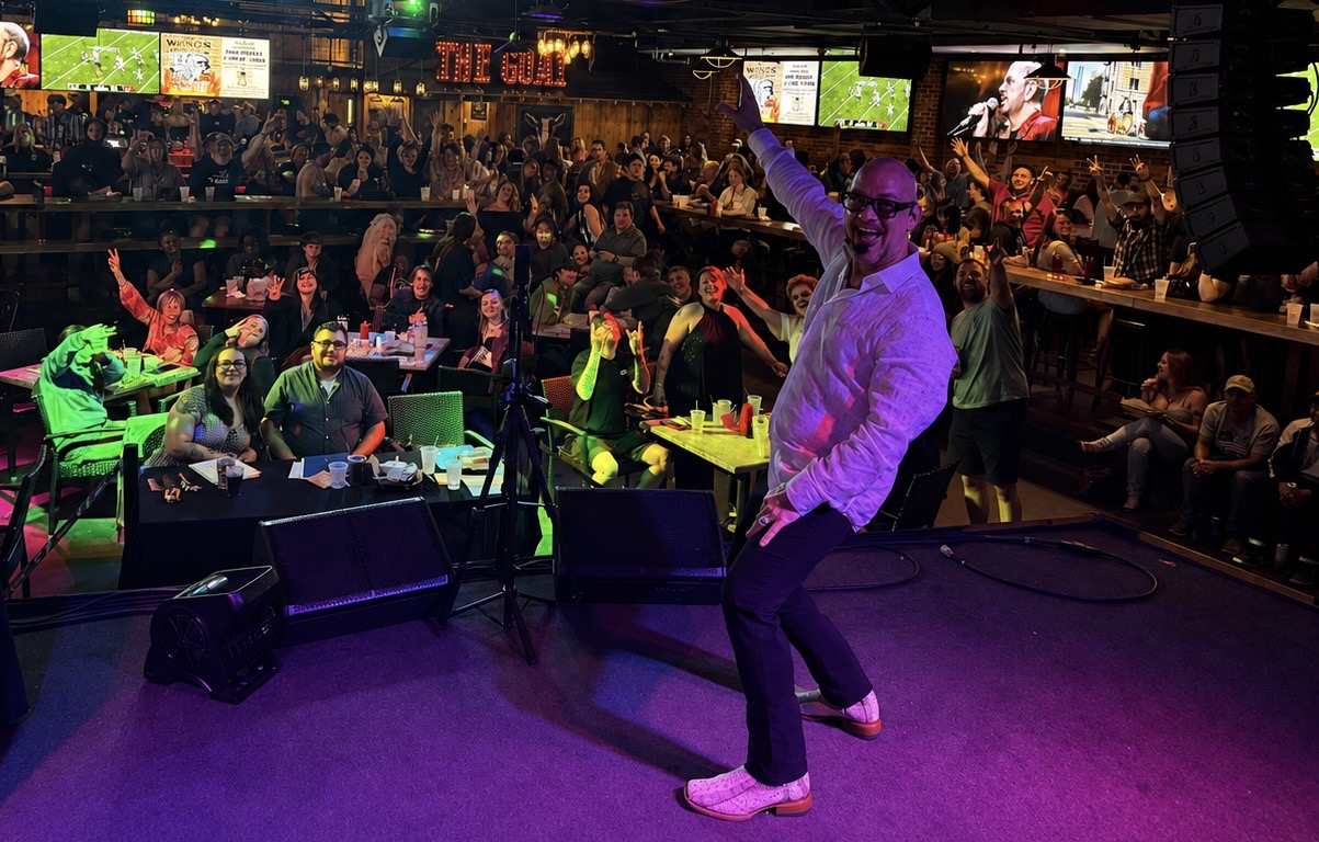 George hosting karaoke before a lively New Hampshire crowd